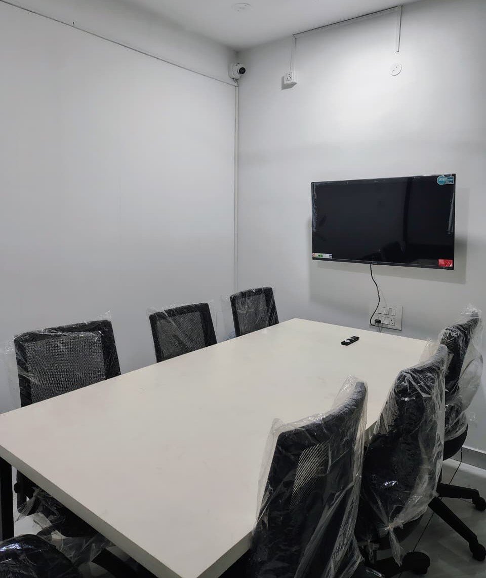 Small team working together in shared office space